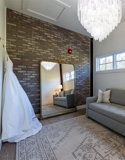 Bridal Suite With Wedding Dress And Floor Mirror