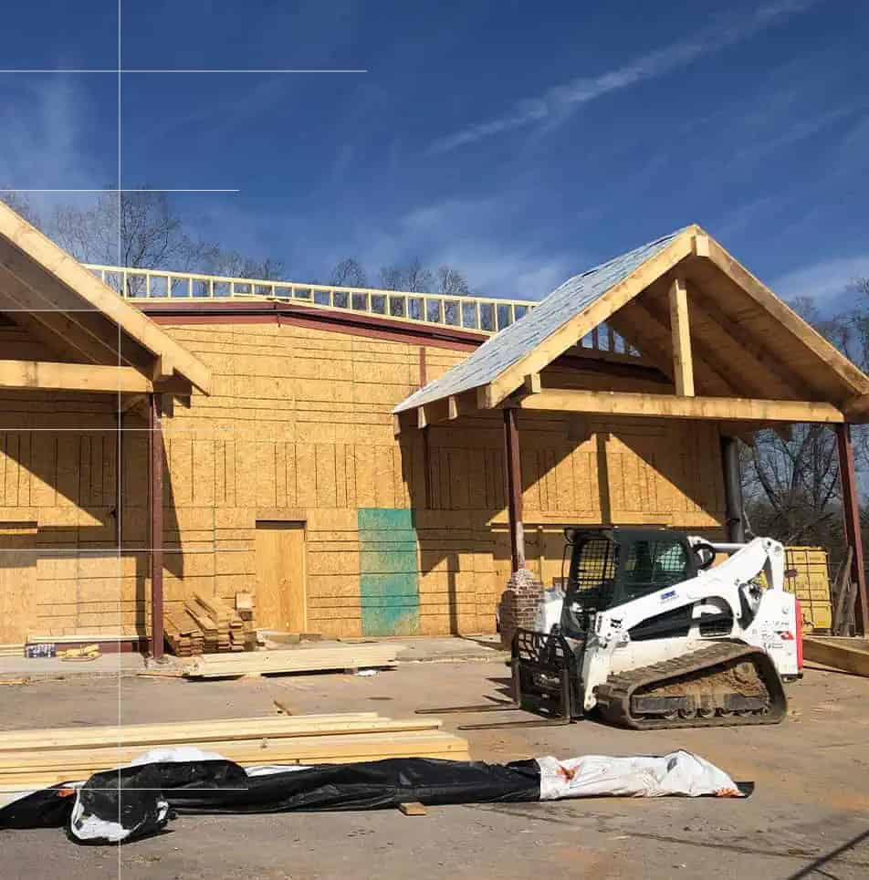 Commercial Construction Site Wood Framing Skid Steer Loader