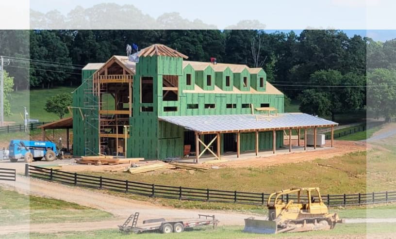 Multi Story Building Construction Green Sheathing Rural Site